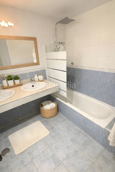 Foto c3e67928-4aa7-4411-8953-b70884db6187. Casa adossada amb calefacció aparcament piscina a Mijas