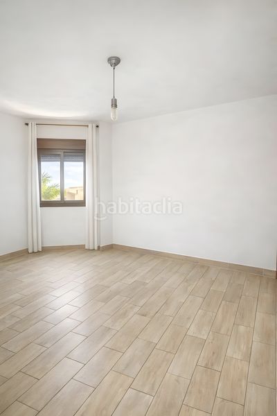 Foto eb3f24a6-5e46-41ee-afa3-f26854de45c5. Casa adossada amb calefacció aparcament piscina a Mijas
