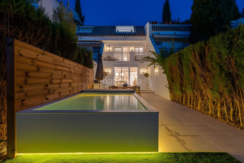 Foto 4bd288c7-aefc-48c0-94a5-77c2b5053234. Casa adossada amb aparcament piscina a Puente Romano Marbella