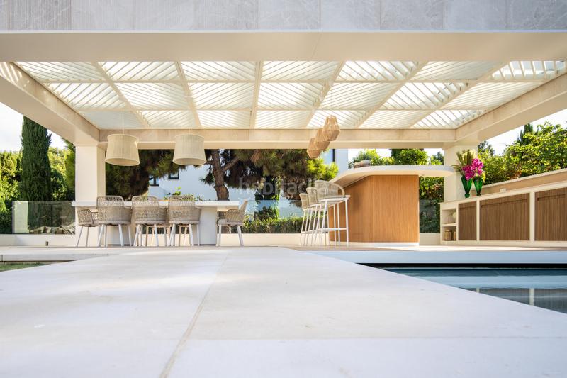 Foto a282beba-59a4-4d9a-afa8-bab3d44fe543. Haus mit parking pool in Puente Romano Marbella