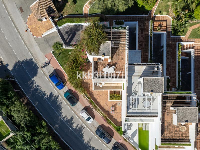 Foto 3dc2d079-7195-4741-8ea6-2de99ef50579. Reihenhaus mit parking pool in Puente Romano Marbella