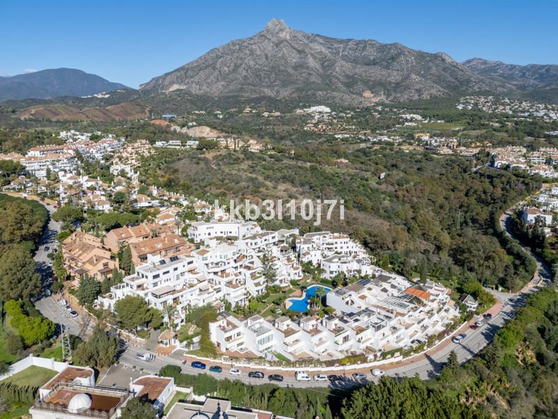 Foto 41291f04-b6ed-499d-98c6-779de29d40d0. Reihenhaus mit parking pool in Puente Romano Marbella
