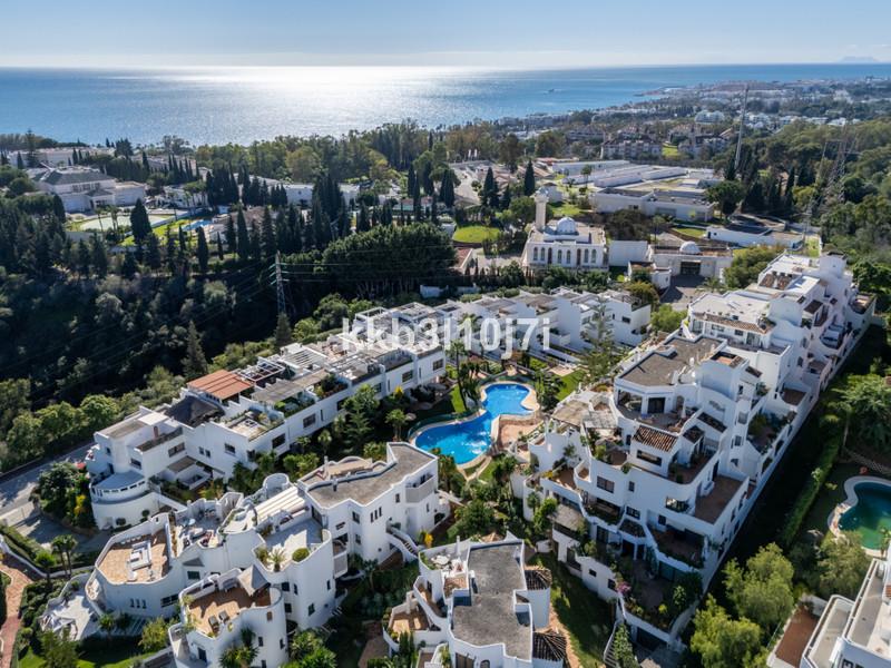 Foto 4d07ccd2-d3bf-40fb-b381-25ecfe5b905f. Reihenhaus mit parking pool in Puente Romano Marbella