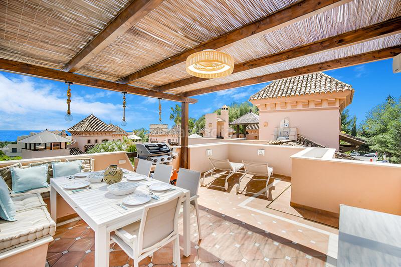 Foto c6fc9224-1221-43cb-a89a-2693fe278101. Reihenhaus mit parking pool in Puente Romano Marbella