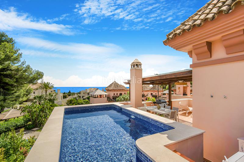 Foto f0954240-0cd2-4e5b-a887-5e9fc85a05f3. Reihenhaus mit parking pool in Puente Romano Marbella