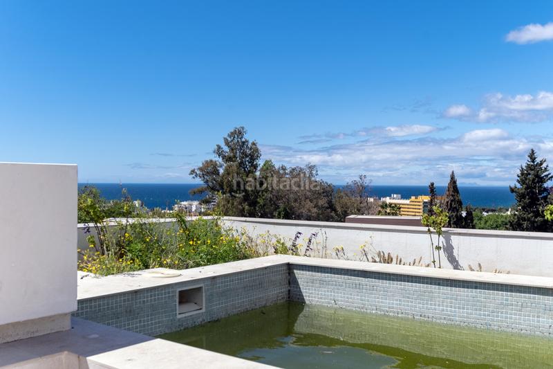 Foto 5ab3f525-31e1-4c5e-b3c7-2d8b3011abfe. Casa amb aparcament piscina a Puente Romano Marbella