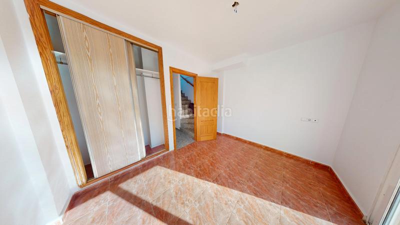 Foto 3c610e35-96d0-4299-bd66-cf5dbea563a8. Casa aparellada amb xemeneia aparcament piscina a Orihuela