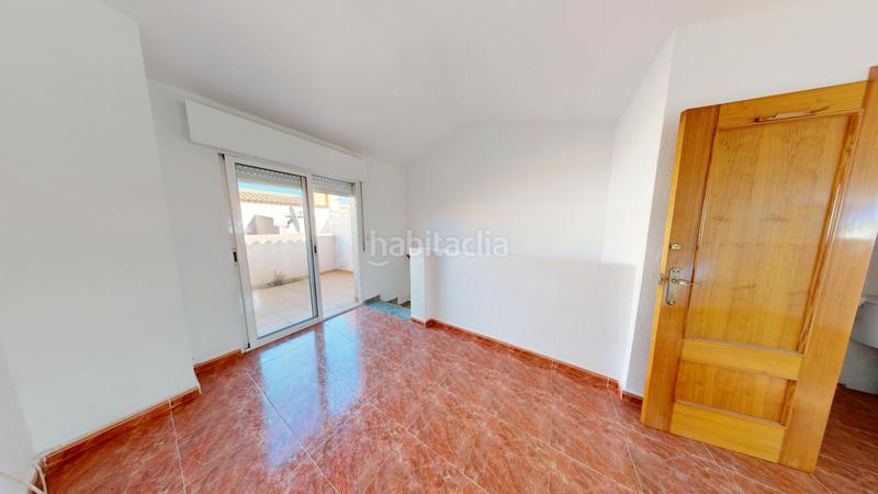 Foto ec7e3115-1e0a-41ec-bcd9-37b07dbe1b59. Casa aparellada amb xemeneia aparcament piscina a Orihuela