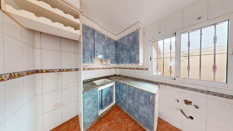 Foto d677a4bf-8839-4177-8872-5006dbbc390d. Maison jumelée avec cheminée parking piscine dans Playa Flamenca Orihuela