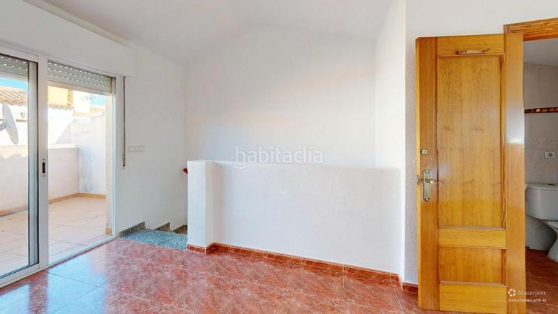 Foto f9b3d7fa-41b4-4469-b71c-eaff81c57c64. Maison jumelée avec cheminée parking piscine dans Playa Flamenca Orihuela