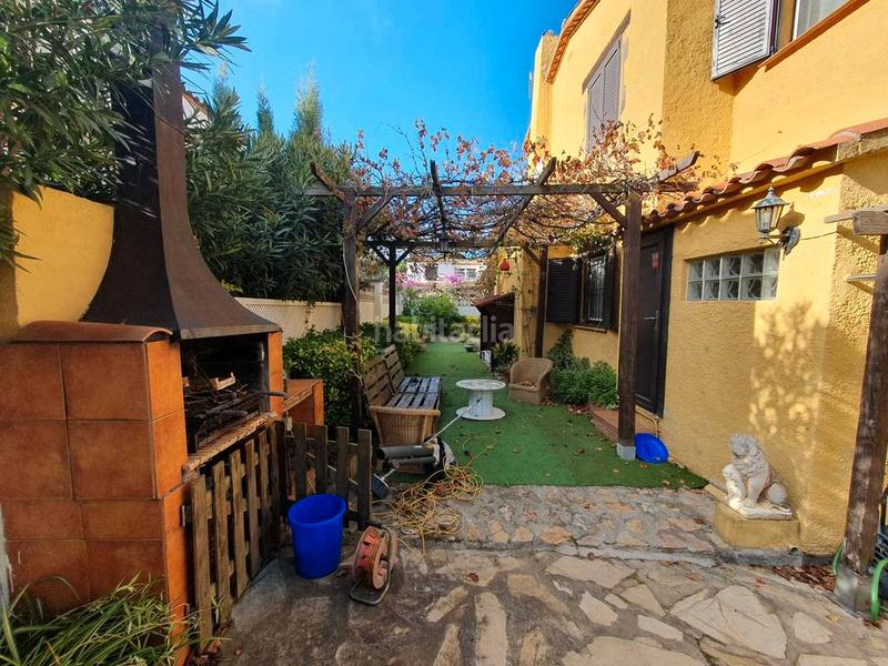 Foto b168dc1b-bbc9-4067-b75f-aa65c665b5ce. Reihenhaus mit kamin heizung in Riells Escala (L´)