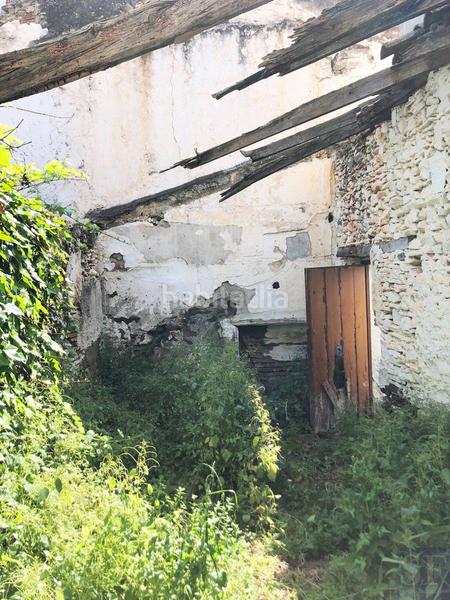 Foto e77db44f-be94-4191-a93f-1a315f6b6964. Casa adosada en Arenas