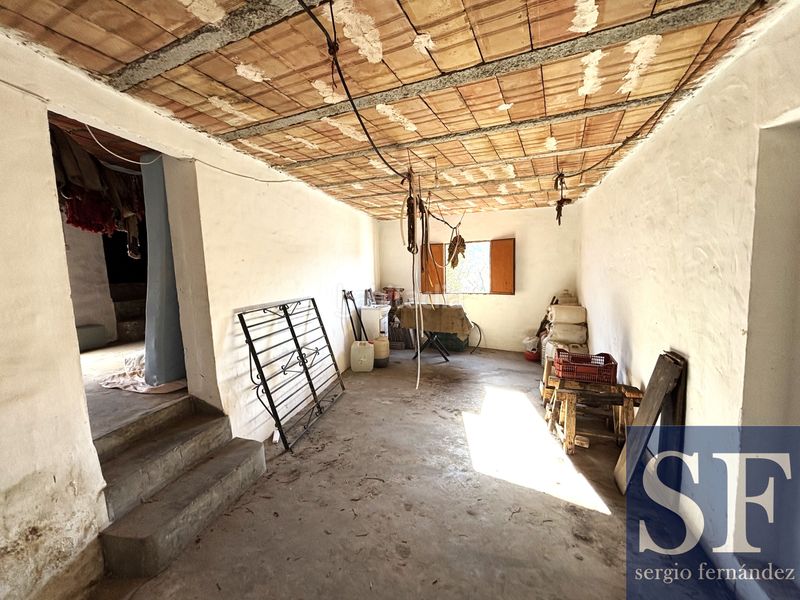 Foto ac1015db-e779-4bf1-91e0-fcdbe05d28c5. Casa adossada a Cómpeta