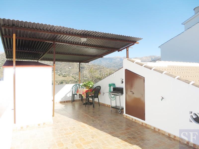 Foto 1a50d3ad-80e0-4b9c-b923-d1c698999785. Casa adossada a Sayalonga