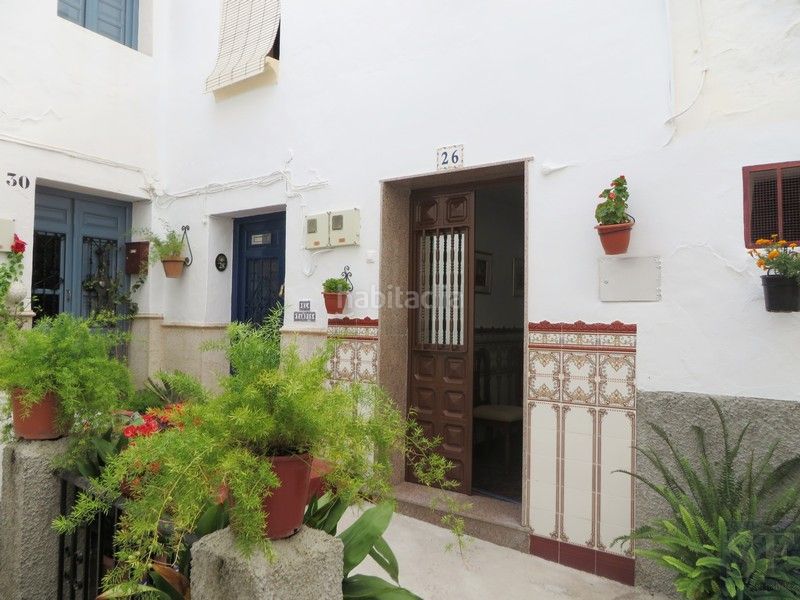 Foto ca57a635-8d86-48d3-9cbd-5660dbfe4aef. Casa adossada a Cómpeta