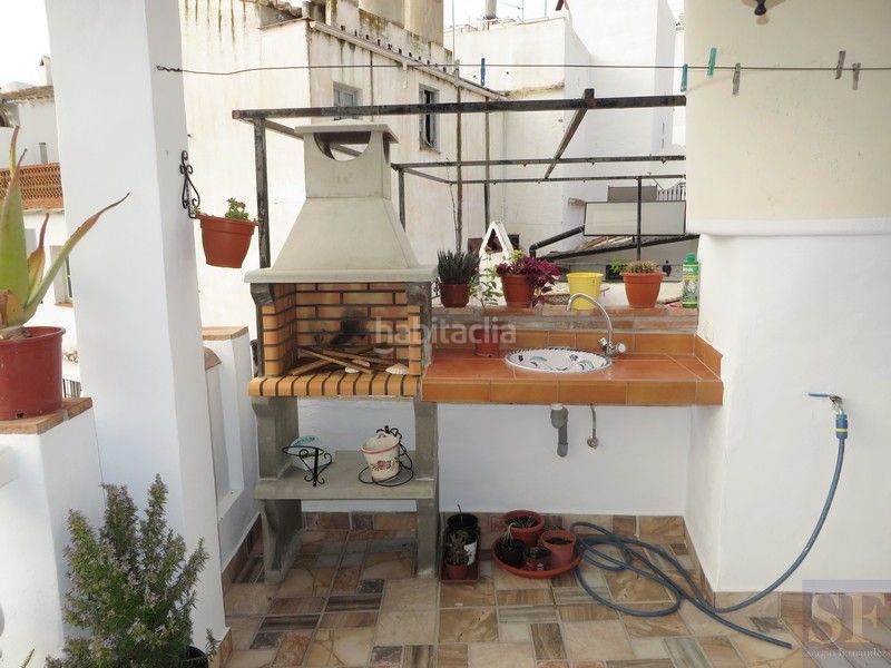 Foto cf87d525-3c6a-4746-8d54-fcf7d9735562. Casa adossada a Cómpeta