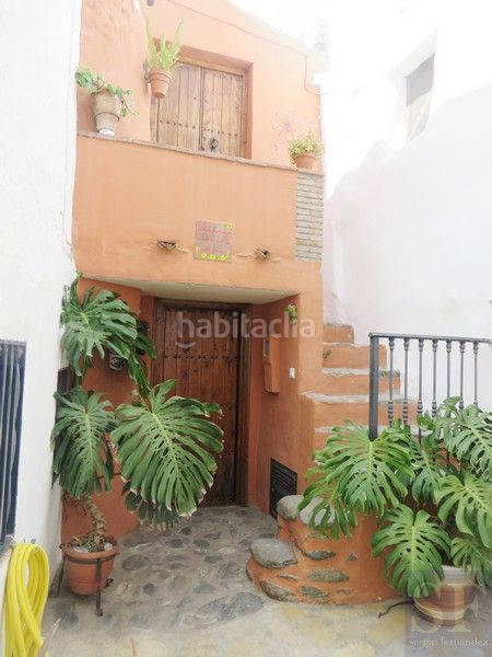 Foto f6459e05-5b87-4441-a1fc-8689776f7c06. Casa adosada en Árchez