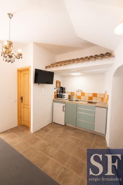 Foto c286411c-e653-4cb7-a27c-19f4d47484e0. Casa adosada en Cómpeta