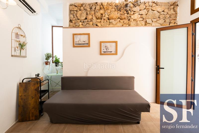 Foto c459e1ac-2b1d-4c4e-b6ec-26d0e26b1711. Casa adosada en Cómpeta
