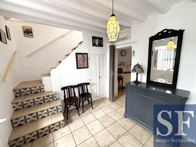 Foto c500c10f-e3f7-4163-b597-fc31c59639d7. Casa adossada a Cómpeta