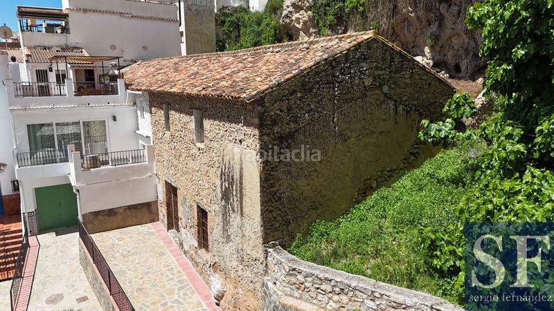 Foto a8632080-08cf-4bf5-ab08-9cc381fcf8d8. Casa adossada a Cómpeta