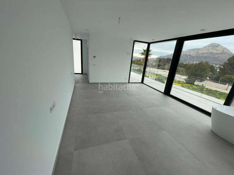 Foto 29f8dc36-5c3b-4d2d-a94a-48d16a3aa26e. Casa amb calefacció aparcament piscina a Partida Comunes-Adsubia Xàbia