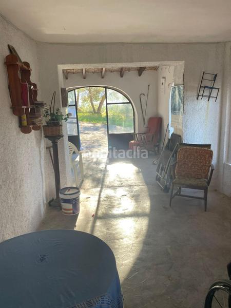 Foto a32bc13e-2bdd-4ad4-ba32-0edee4458a7f. Masia amb xemeneia calefacció aparcament a Benissa pueblo Benissa