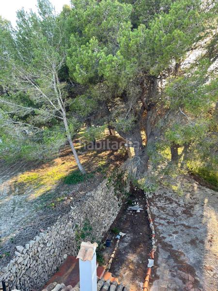 Foto ede1b26c-11ed-473e-aca2-15e5253bbbf6. Masia amb xemeneia calefacció aparcament a Benissa pueblo Benissa