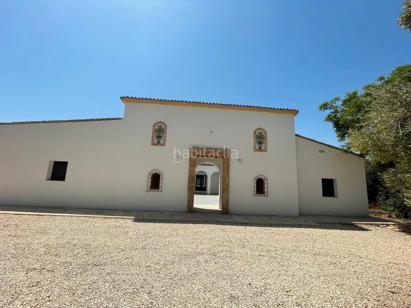 Foto 23d38e06-c06a-477b-aed3-3085a43204ba. Mas avec cheminée chauffage parking piscine dans La Granadella - Costa Nova Xàbia