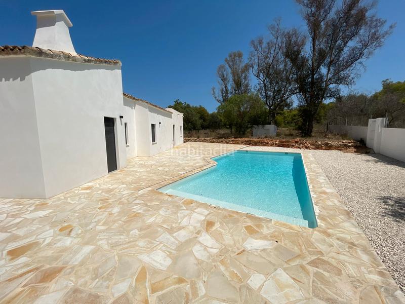 Foto 3fb5e5e1-f6d1-4c8b-9c63-345b39f5e01d. Mas avec cheminée chauffage parking piscine dans La Granadella - Costa Nova Xàbia