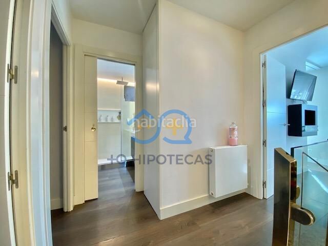 Foto e7fb3d74-eb1f-4ddf-aa25-0303c5d50313. Casa adosada mas que hipotecas vende en exclusiva chalet con piscina madrid en Parla