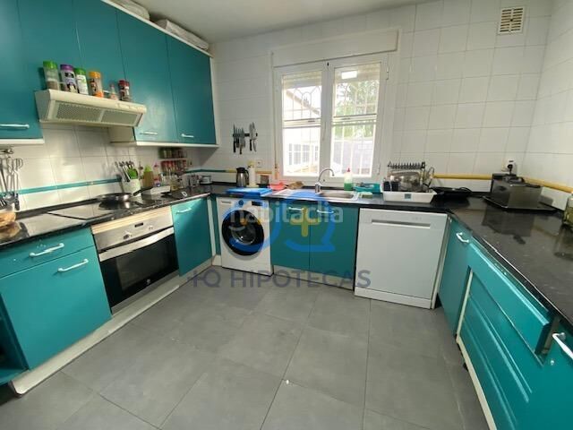 Foto 814f9faa-9642-416f-bd5d-eef0d3399439. Casa aparellada amb calefacció aparcament a Ugena