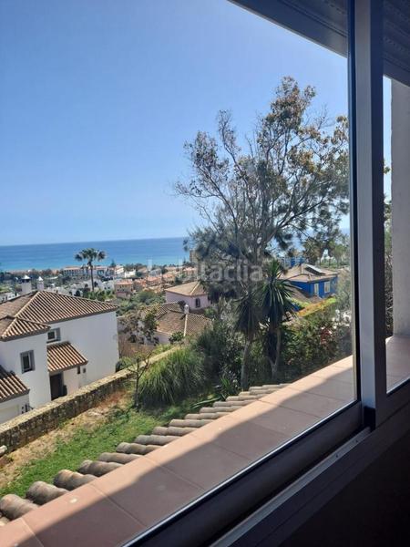 Foto eb0e2c54-34ec-42fa-a7a1-a6e332f6606e. Xalet amb calefacció aparcament a La Duquesa Manilva