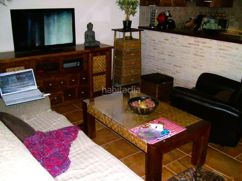 Foto 2b216a7c-c01c-4a38-88ed-e1f3cc03c018. Casa adossada amb xemeneia a Playa de los Náufragos Torrevieja