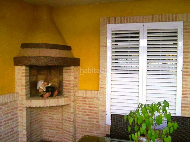 Foto e1a0449c-4157-4677-938d-40fb1bd5afd0. Casa adossada amb xemeneia a Playa de los Náufragos Torrevieja