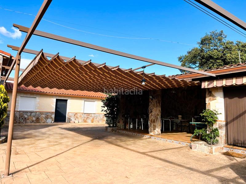 Foto c03a9765-d5f0-472b-8aba-2e65c1adace8. Masia amb xemeneia calefacció aparcament piscina a Santa Cruz del Retamar