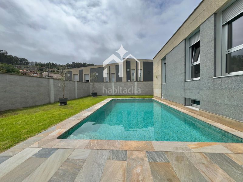 Foto cf65718b-0acc-4e15-ab4e-1b260660a2bb. Xalet amb calefacció aparcament piscina a Darbo Cangas