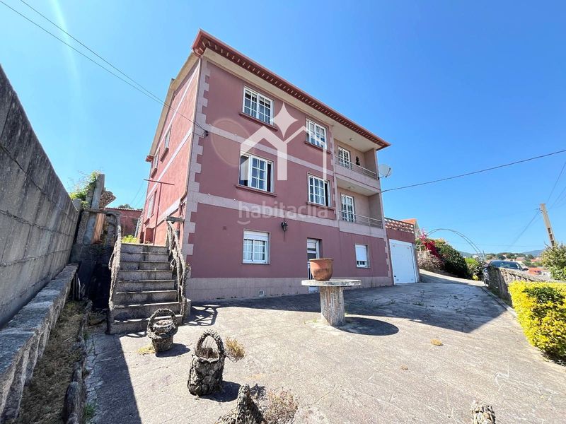 Foto a2c8b1b1-da8d-4c90-9cb2-d2c4a0731f8e. Casa amb calefacció aparcament a Moaña