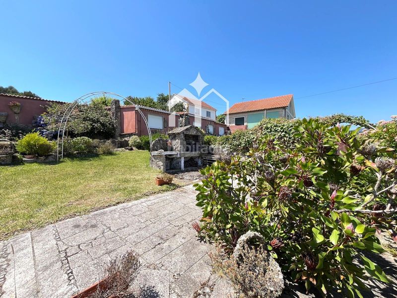 Foto d9435c23-e90c-423b-8cd9-03deed54d1fe. Casa amb calefacció aparcament a Moaña
