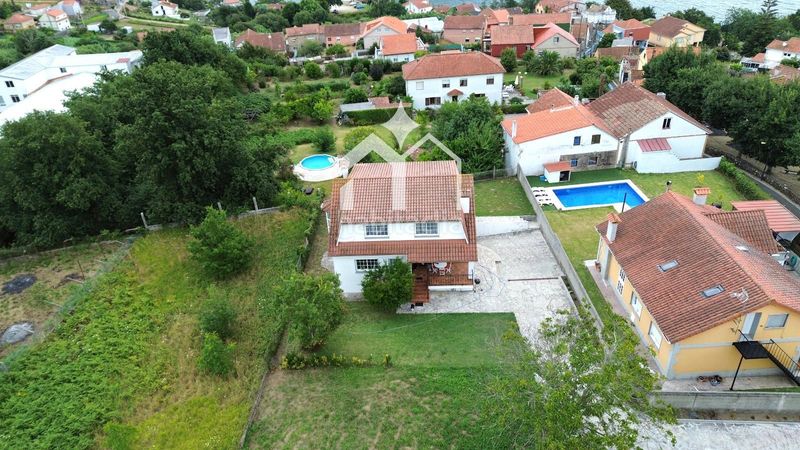 Foto db789bbd-82ae-4133-9c66-3a32ba045f08. Casa amb calefacció aparcament a Moaña