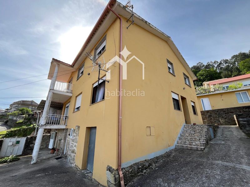 Foto 854faa5a-da01-4d07-8ba1-4984bd56afe2. Casa amb calefacció aparcament a Moaña