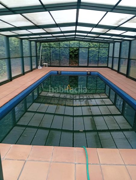 Foto 0432dbf6-fd2f-46c1-8d2d-67ca48d27e8d. Casa amb aparcament piscina a Somió Gijón
