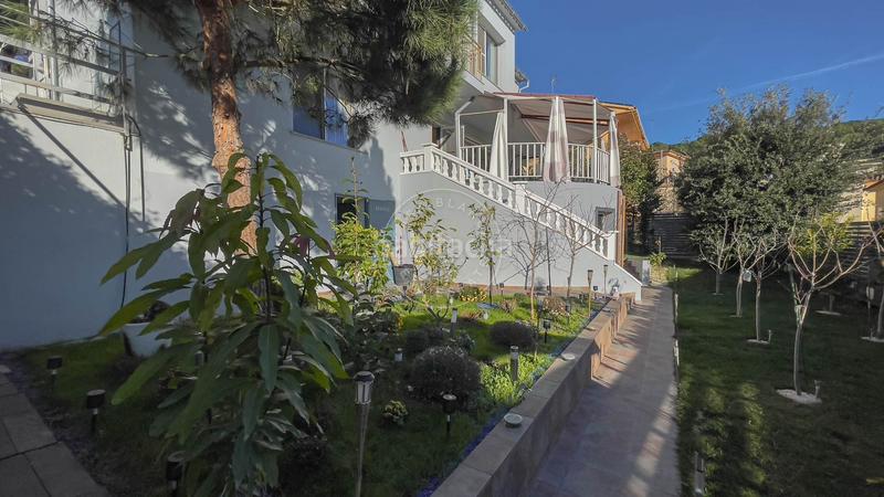 Foto 1cc56e91-ab00-485e-a1e7-00ee93de0de8. Casa  con jardín y terraza en Mas Romeu Lloret de Mar
