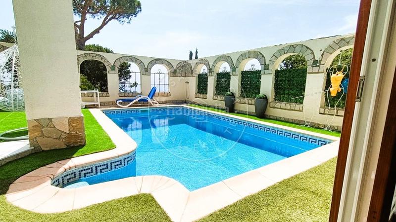 Foto 97871ca8-53e6-4268-8e11-d257a0690069. House with parking pool in Serra Brava Lloret de Mar