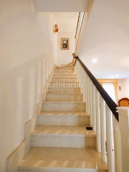 Foto 592a1edf-f867-46db-a43e-fe8928089c56. Casa a schiera con camino riscaldamento parcheggio piscina in Boadilla del Monte