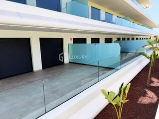 Pis a Playa Fañabé Alto. Bajo de diseño con gran terraza en atlantic homes ii