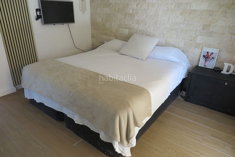 Foto 0d4e1dee-8ba2-45f1-8995-a06f5dcfa196. Casa adossada amb calefacció piscina a Pueblo Español-Coveta Fumá Campello (el)
