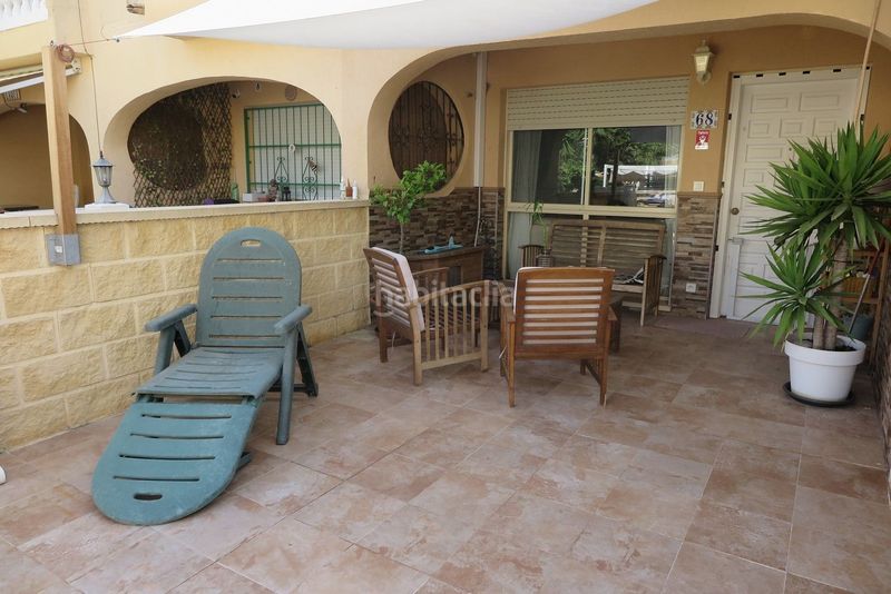 Foto aed8e68c-e715-4269-8fc0-2f975e64c6f6. Casa adossada amb piscina a Pueblo Acantilado-Lanuza Campello (el)