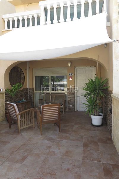 Foto fae51e25-8615-4905-ab20-31611f511043. Casa adossada amb piscina a Pueblo Acantilado-Lanuza Campello (el)