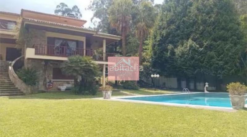 Foto 003b54da-881e-4fc8-b51d-4fea40eeb4a5. Chalet con camino parcheggio piscina in Gondomar